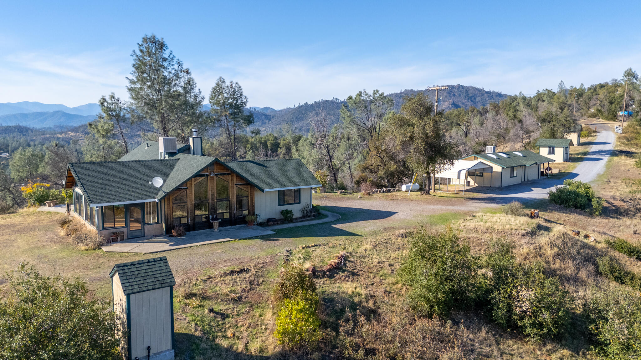 14018 Highview Trail Redding, CA 96003 - Photo 26 of 41 a view of a house with a yard covered in snow