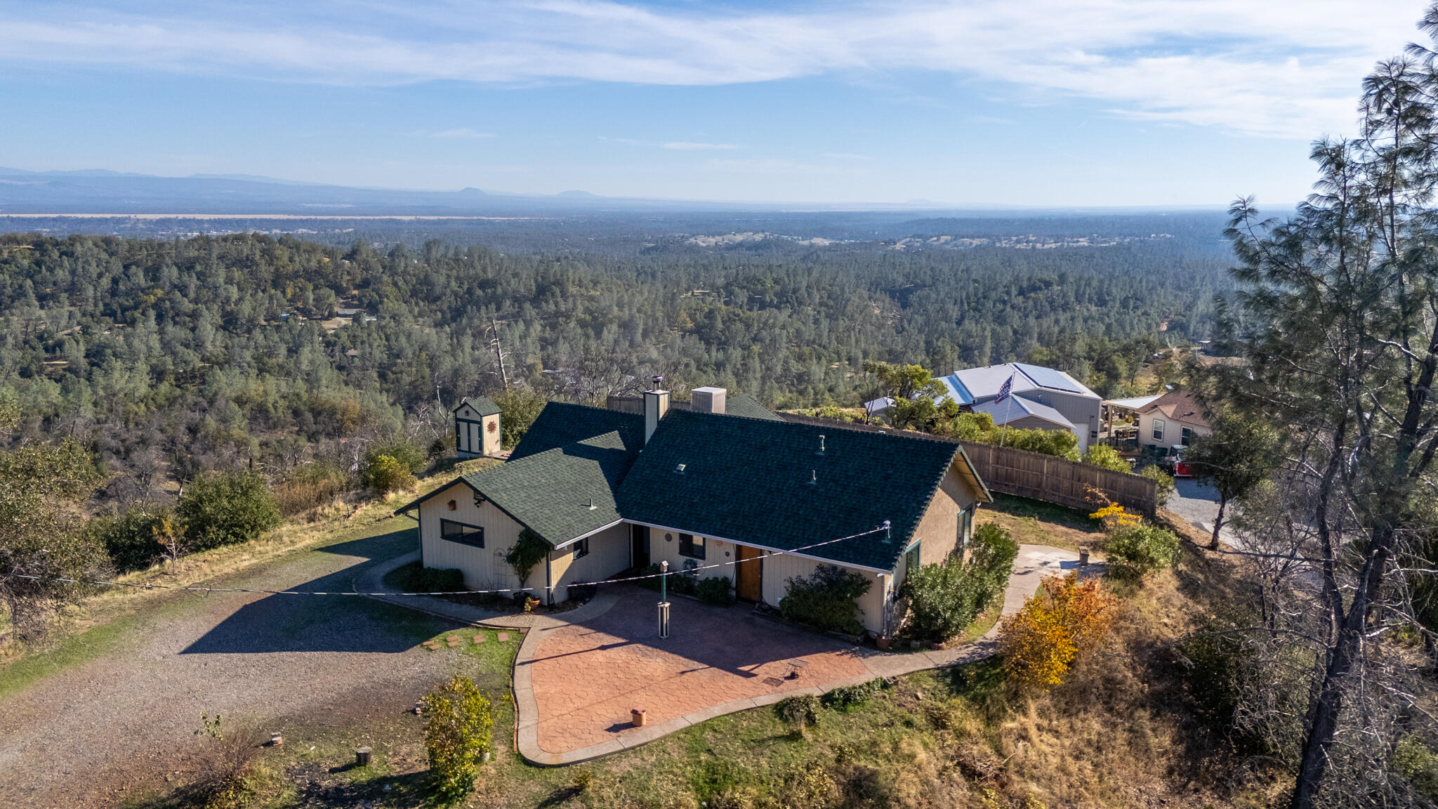 14018 Highview Trail Redding, CA 96003 - Photo 4 of 41 an aerial view of a house with a yard and mountain view in back