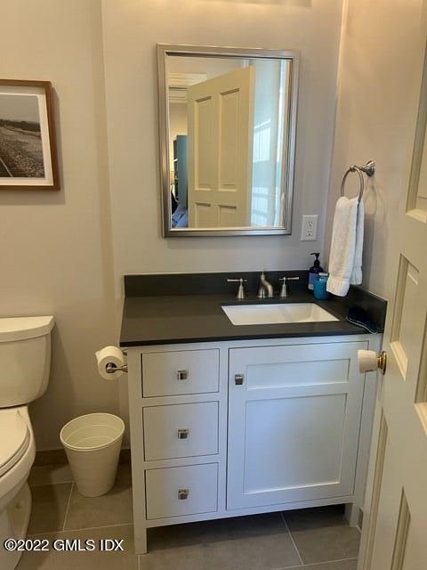 30 Field Point Drive, Unit GUEST HOUSE Greenwich, CT 06830 - Photo 11 of 11 a bathroom with a toilet a sink and a mirror