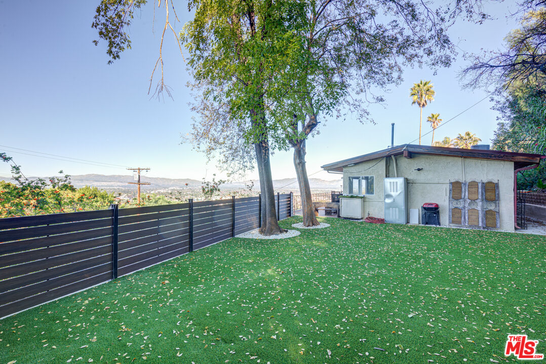 4520 Gable Drive Encino, CA 91316 - Photo 14 of 58 a view of a house with a yard and sitting area
