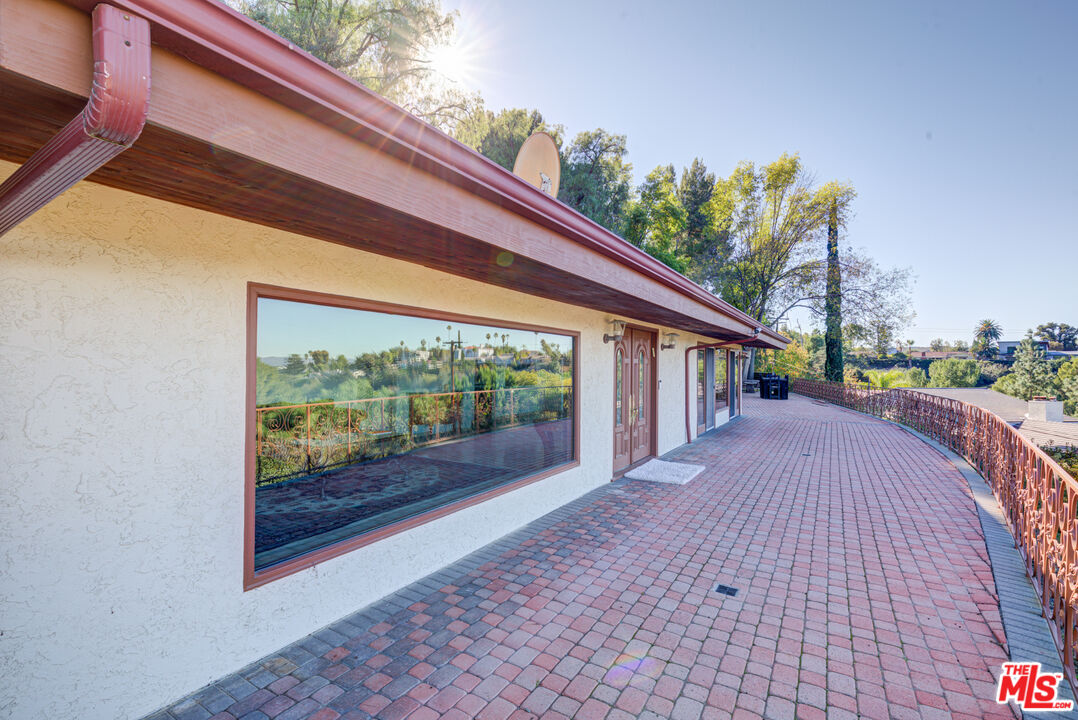 4520 Gable Drive Encino, CA 91316 - Photo 17 of 58 a balcony with view of an outdoor space
