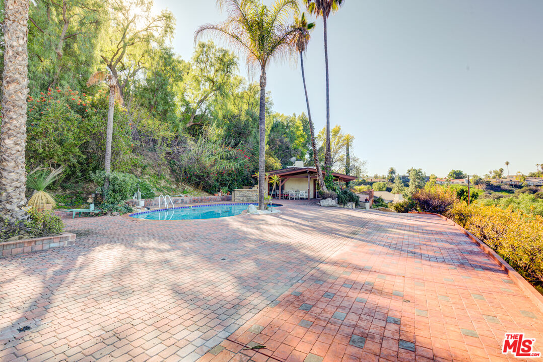 4520 Gable Drive Encino, CA 91316 - Photo 23 of 58 a view of a terrace with sitting area