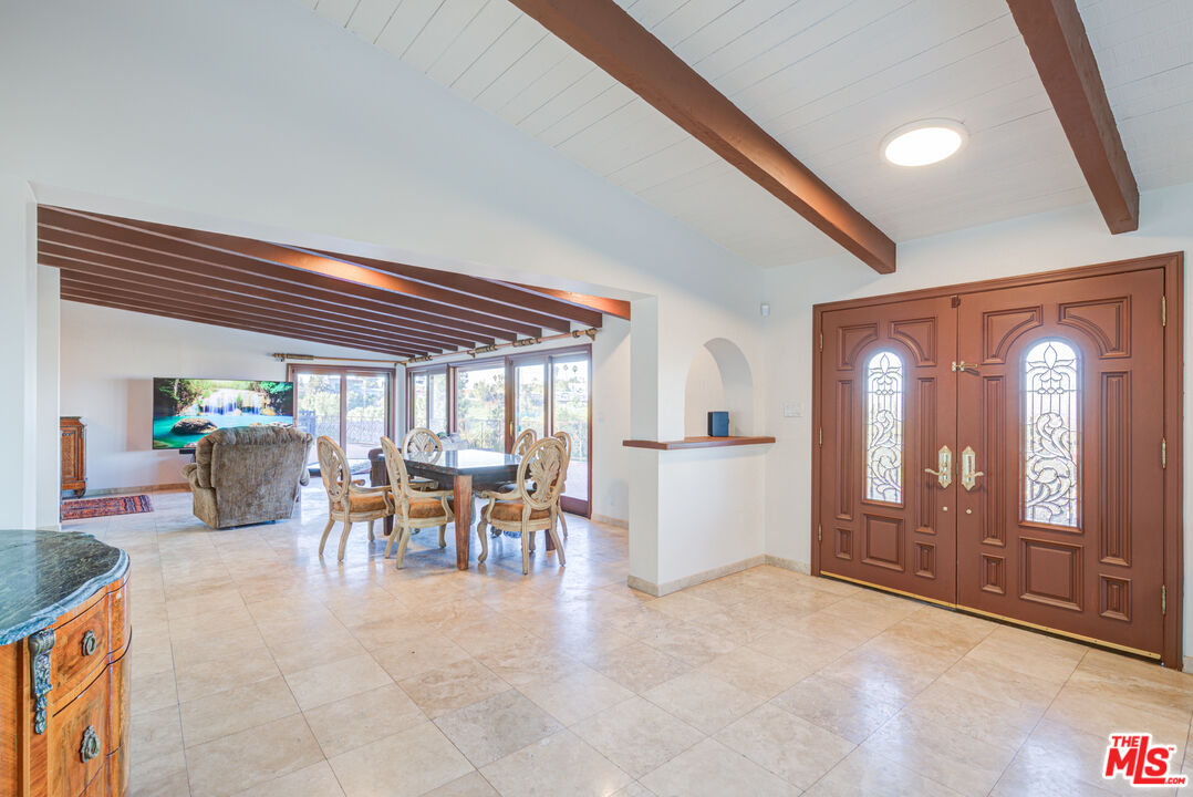 4520 Gable Drive Encino, CA 91316 - Photo 33 of 58 a view of a livingroom with furniture and a window