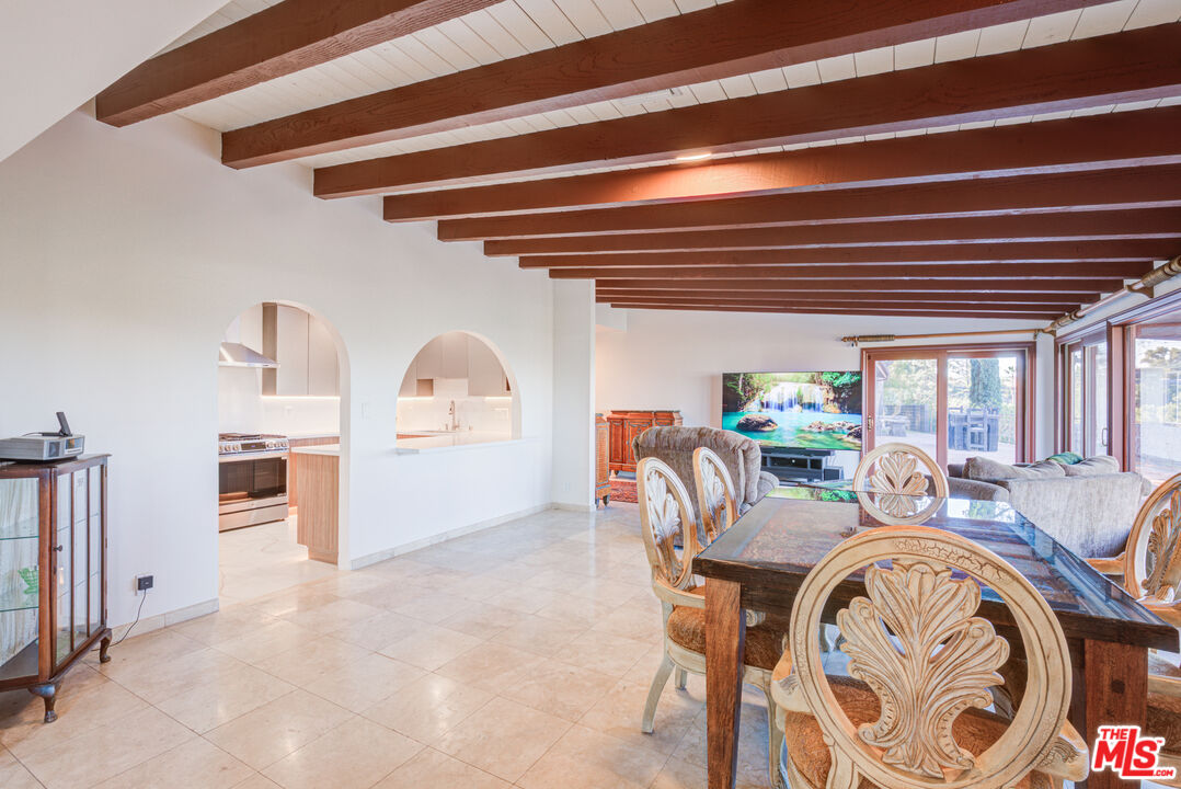 4520 Gable Drive Encino, CA 91316 - Photo 35 of 58 a view of a dining room with furniture window and flowerpot