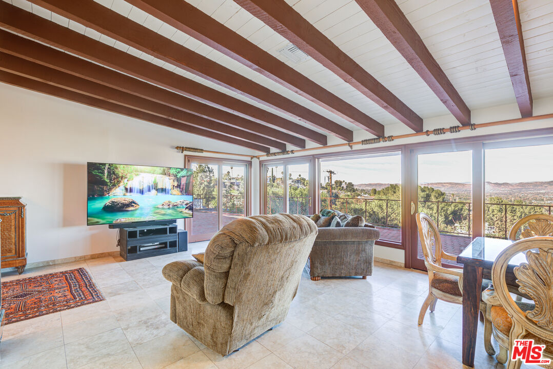 4520 Gable Drive Encino, CA 91316 - Photo 36 of 58 a living room with furniture and a large window