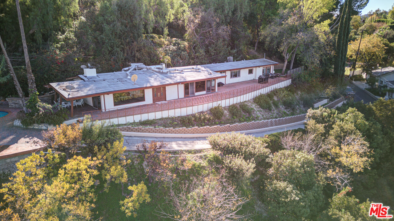 4520 Gable Drive Encino, CA 91316 - Photo 4 of 58 a view of a house with a yard
