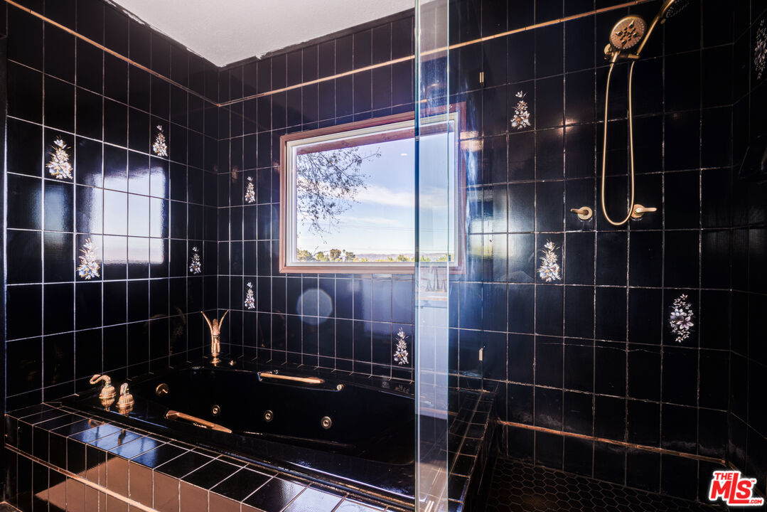 4520 Gable Drive Encino, CA 91316 - Photo 56 of 58 a bathroom with a glass shower