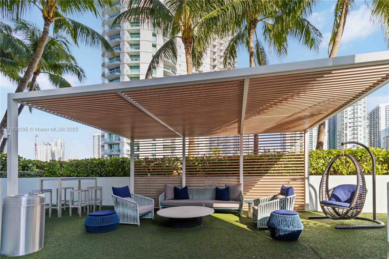 90 Southwest 3rd Street, Unit 4305 Miami, FL 33130 - Photo 13 of 16 a backyard of a house with seating space