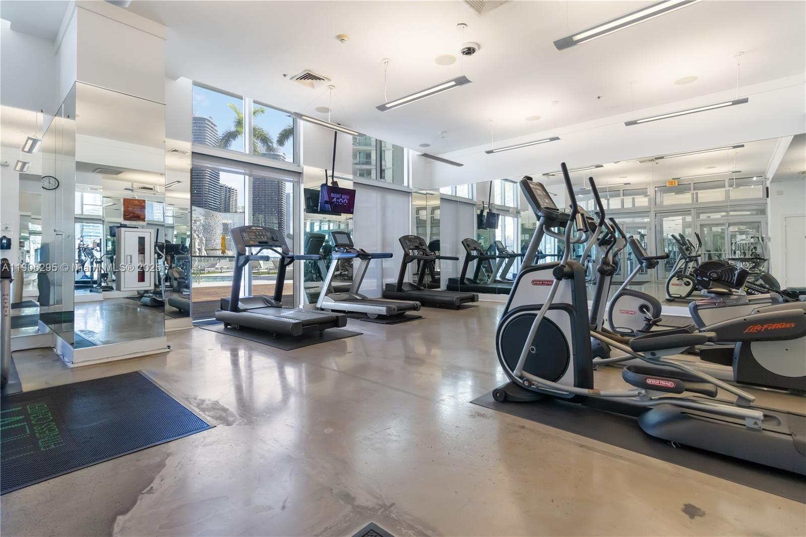 90 Southwest 3rd Street, Unit 4305 Miami, FL 33130 - Photo 14 of 16 a view of a room with gym equipment