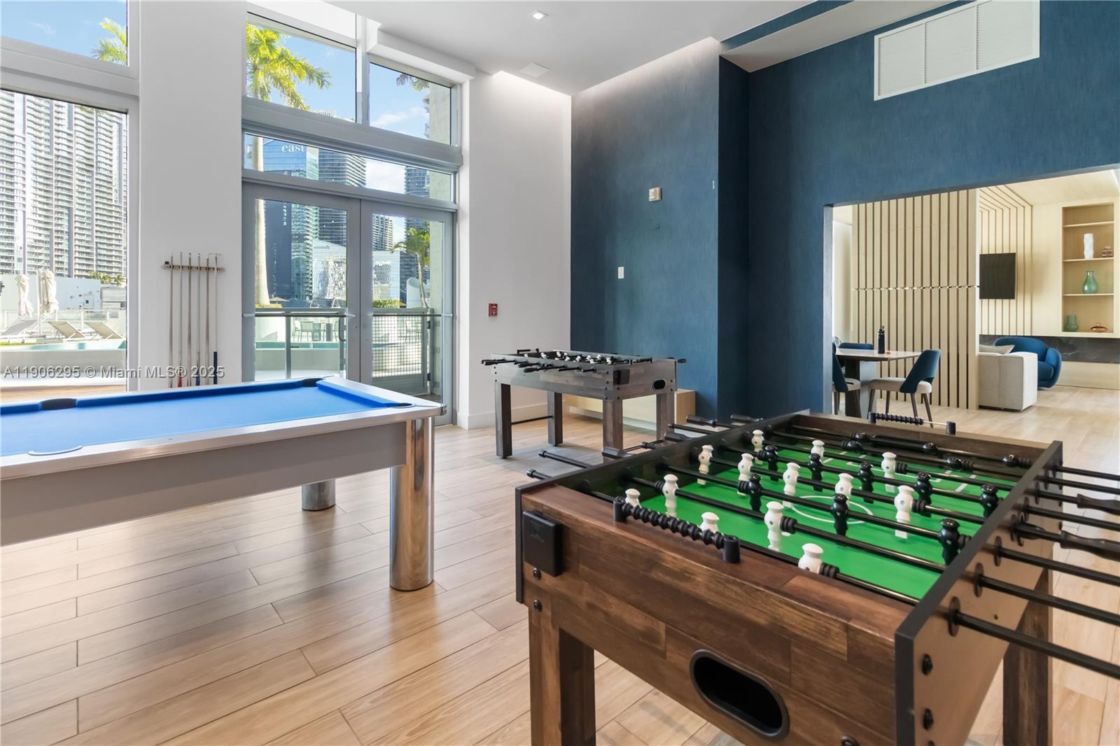 90 Southwest 3rd Street, Unit 4305 Miami, FL 33130 - Photo 15 of 16 a living room filled with furniture and a table