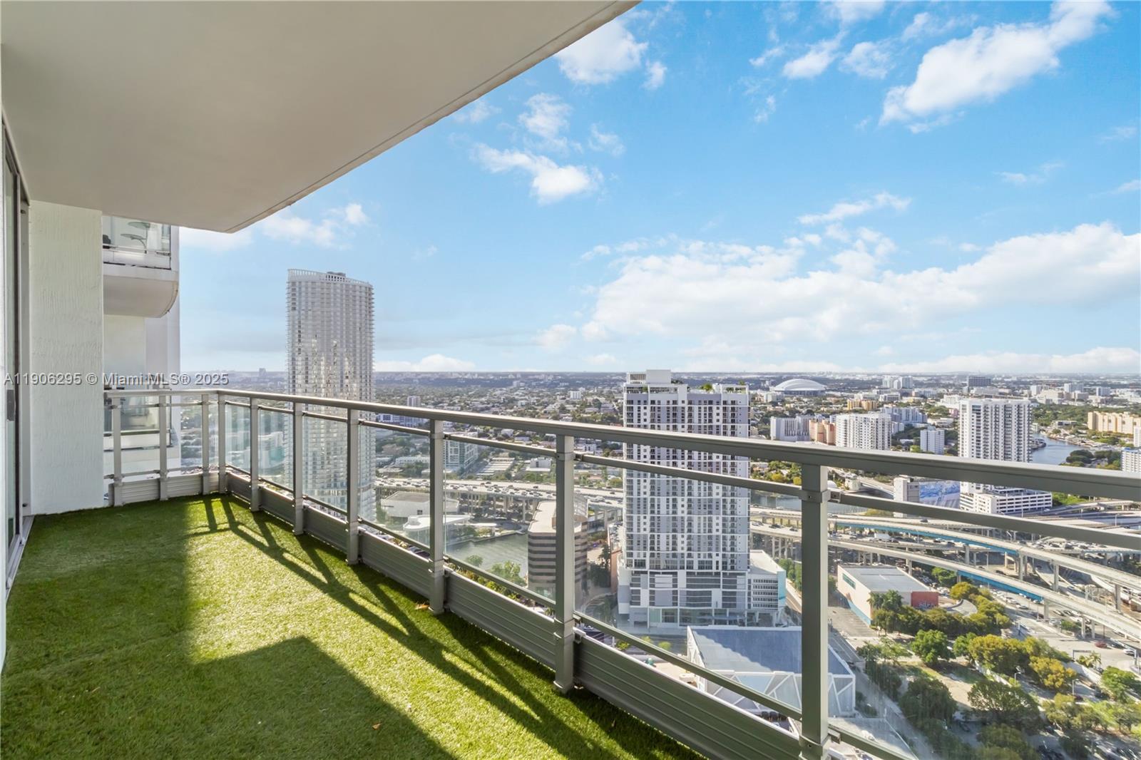 90 Southwest 3rd Street, Unit 4305 Miami, FL 33130 - Photo 2 of 16 a view of a balcony with city view