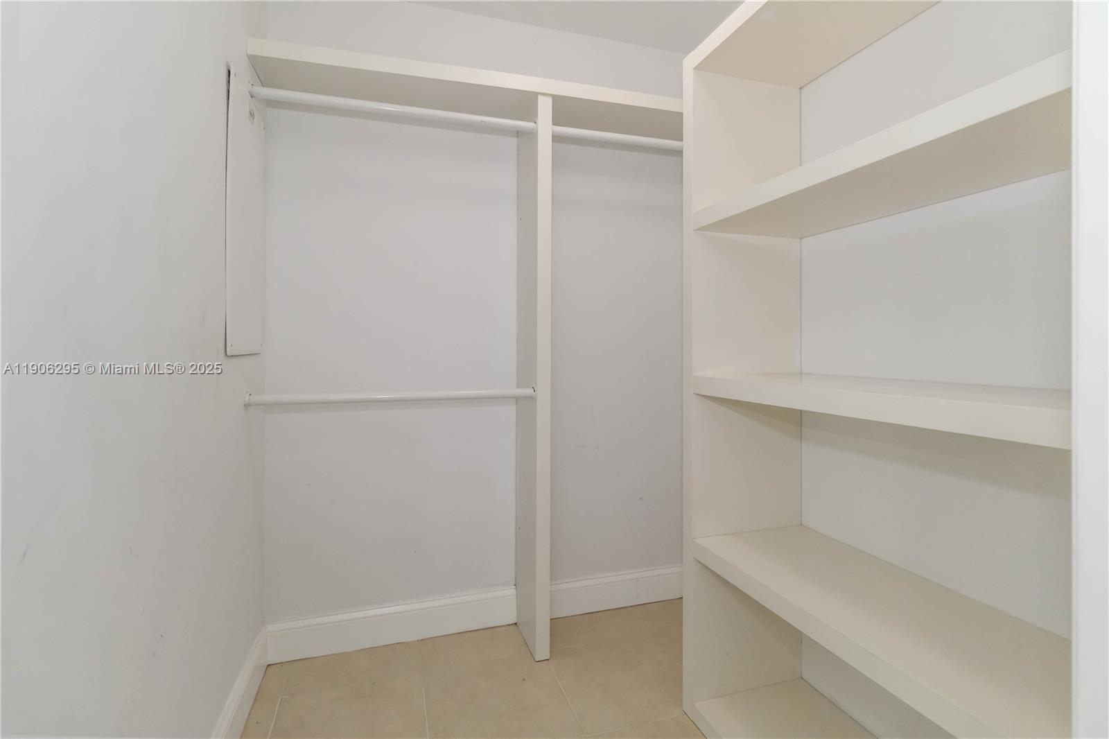 90 Southwest 3rd Street, Unit 4305 Miami, FL 33130 - Photo 7 of 16 a view of an empty walk in closet