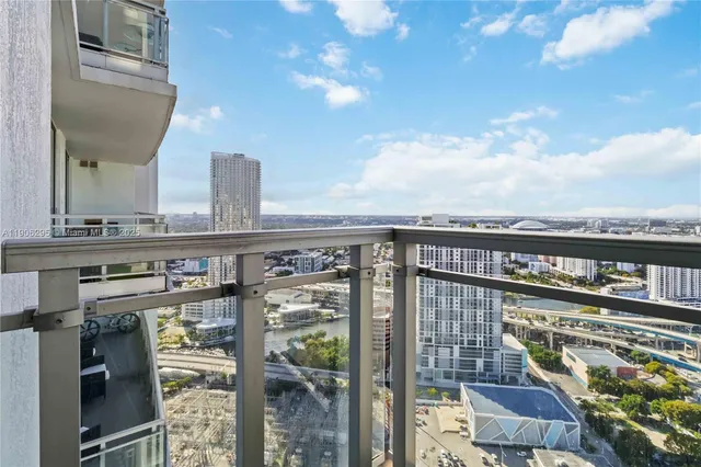 a view of a city with tall buildings