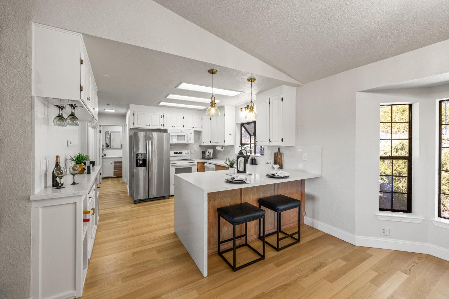 14580 McElroy Road Auburn, CA 95602 - Photo 1 of 48 a kitchen with stainless steel appliances a sink dishwasher stove refrigerator and cabinets