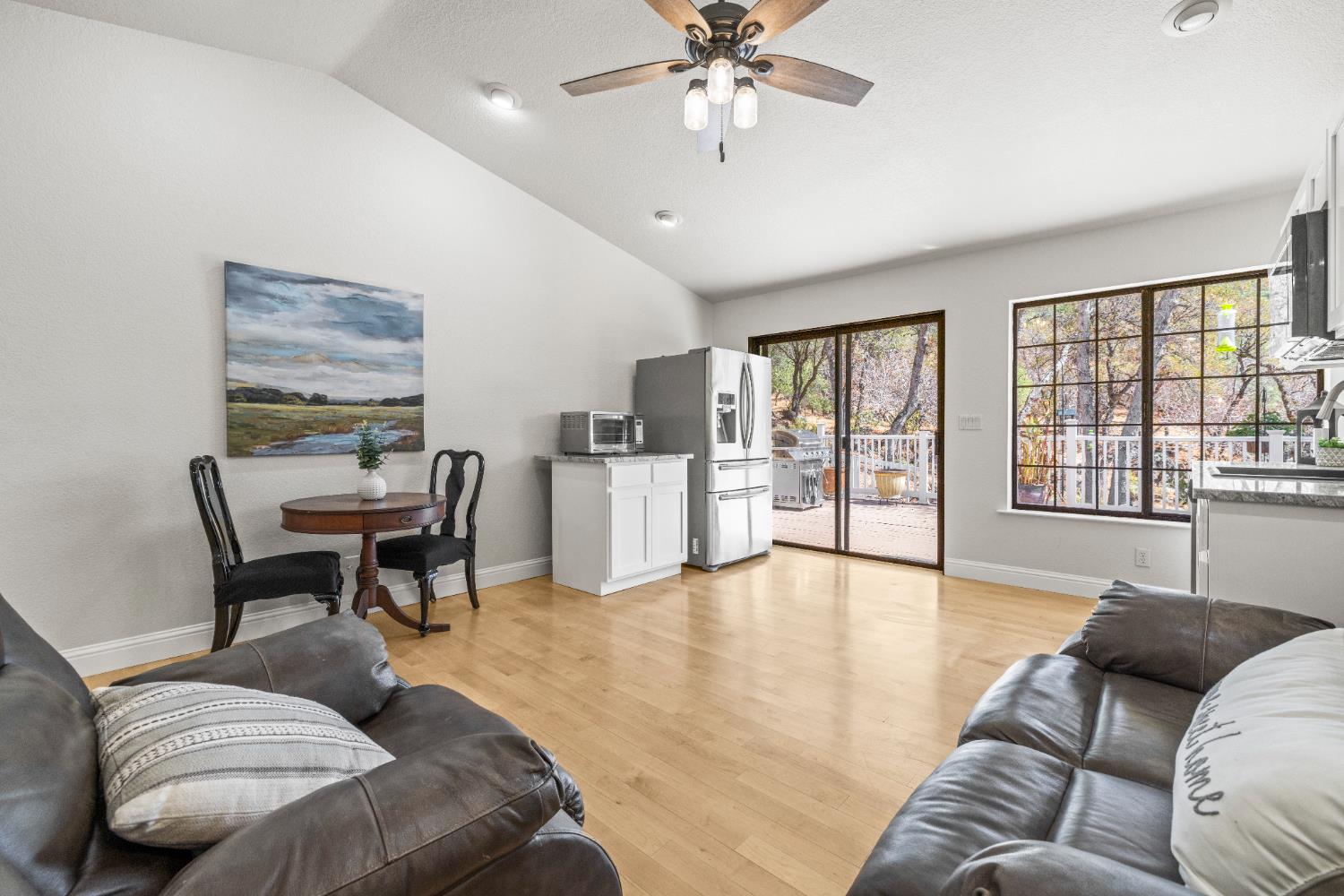 14580 McElroy Road Auburn, CA 95602 - Photo 12 of 48 a living room with furniture and large window