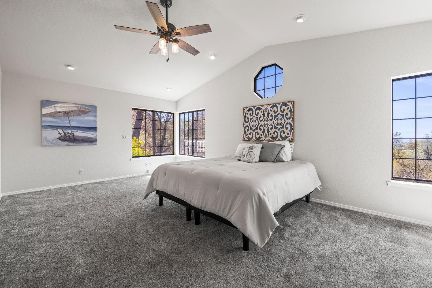 14580 McElroy Road Auburn, CA 95602 - Photo 15 of 48 a bedroom with a bed and a window