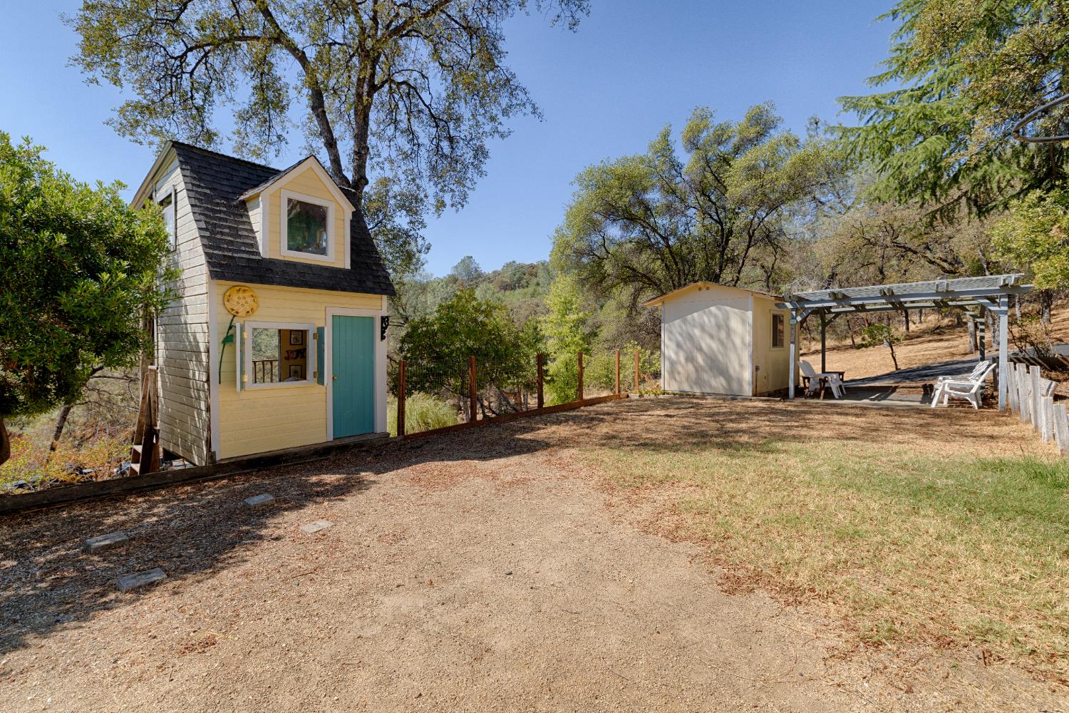 14580 McElroy Road Auburn, CA 95602 - Photo 38 of 48 a front view of a house with a yard