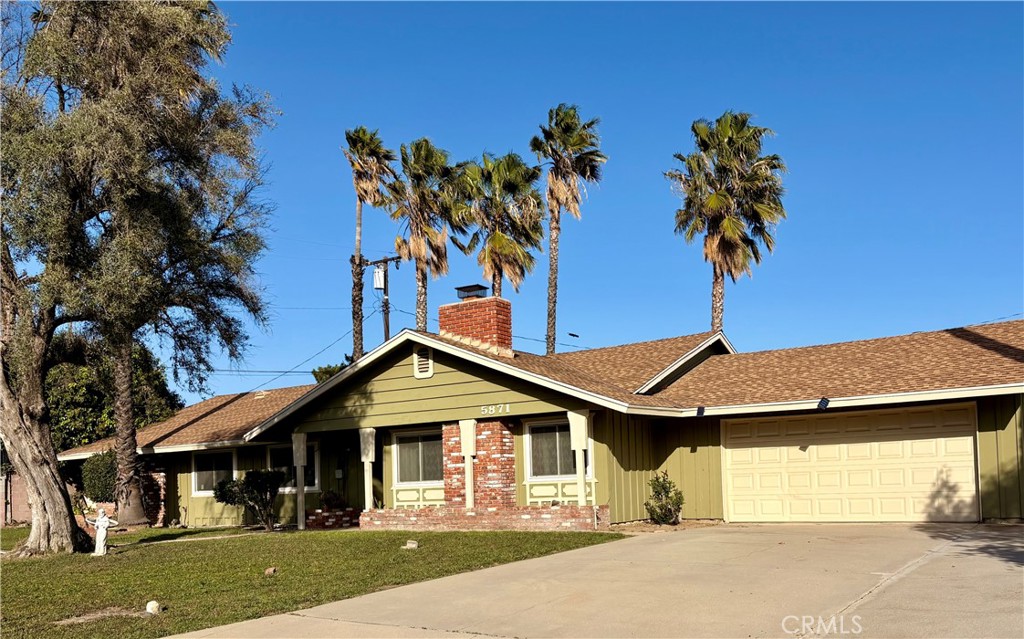 5871 Geremander Avenue Rialto, CA 92377 - Photo 5 of 5 2-car garage with ample driveway parking