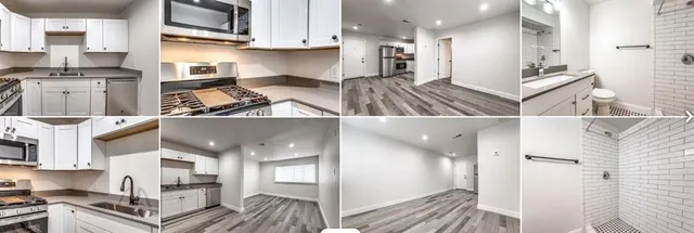 a view of kitchen with stainless steel appliances granite countertop a refrigerator and a sink