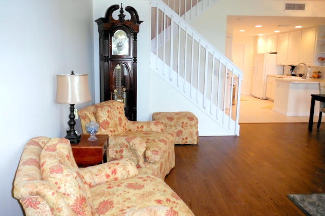 140 Radcliffe Court Jupiter, FL 33458 - Photo 7 of 25 Living Room Kitchen Stairs