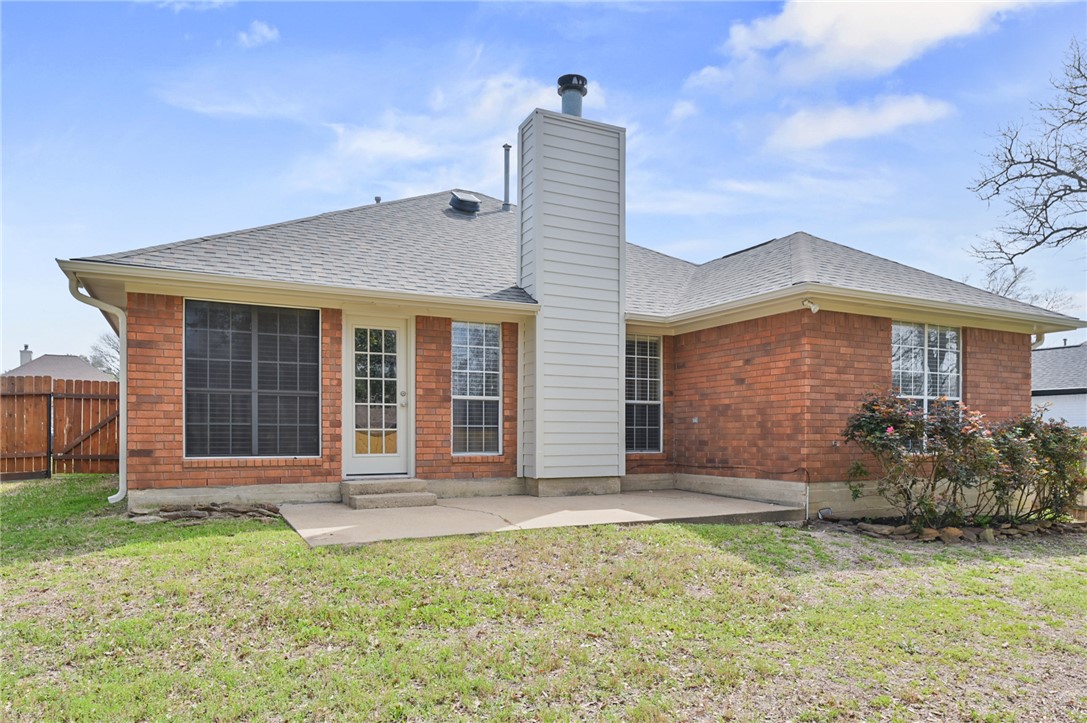 1804 Ibis Court Bryan, TX 77807 - Photo 16 of 17 front view of a house with a garden