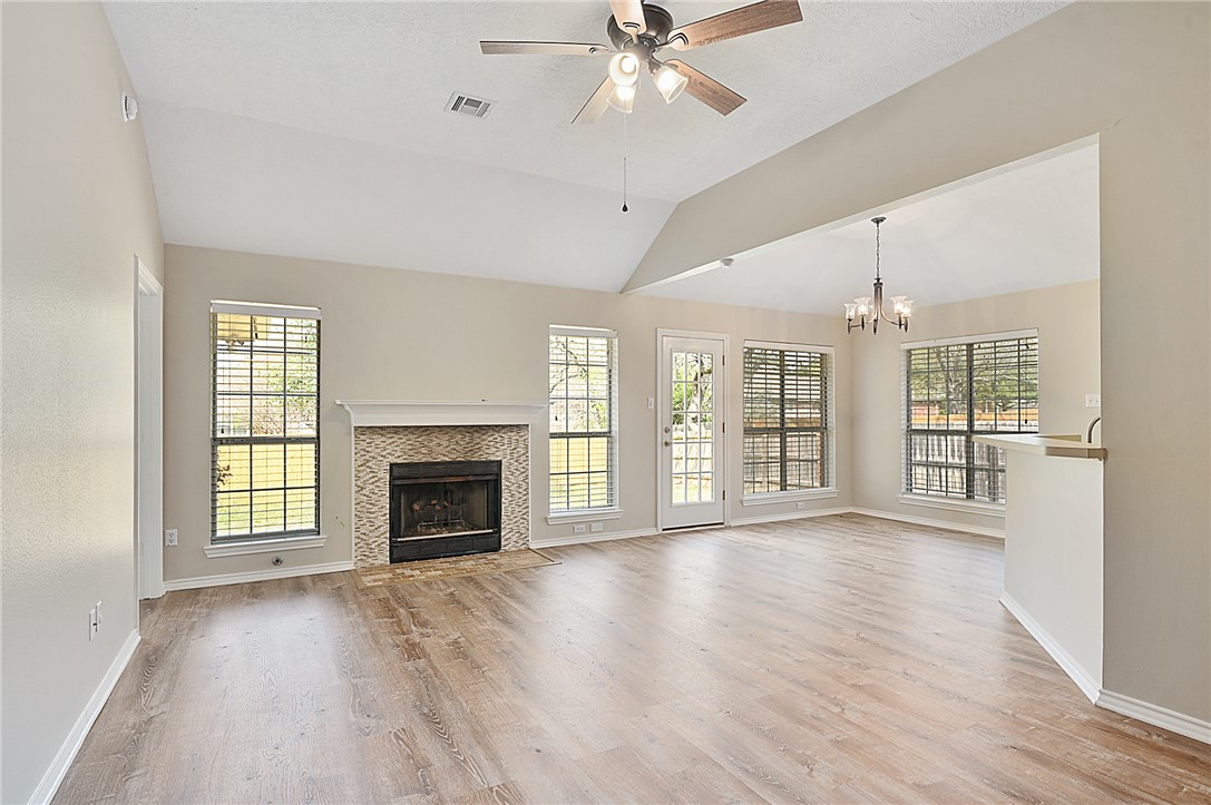1804 Ibis Court Bryan, TX 77807 - Photo 2 of 17 a view of an empty room with window and fire place