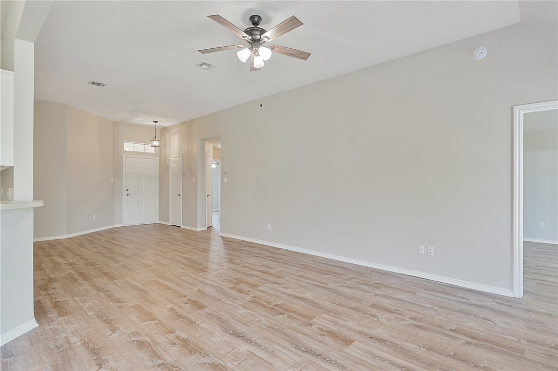 1804 Ibis Court Bryan, TX 77807 - Photo 3 of 17 a view of an empty room with wooden floor