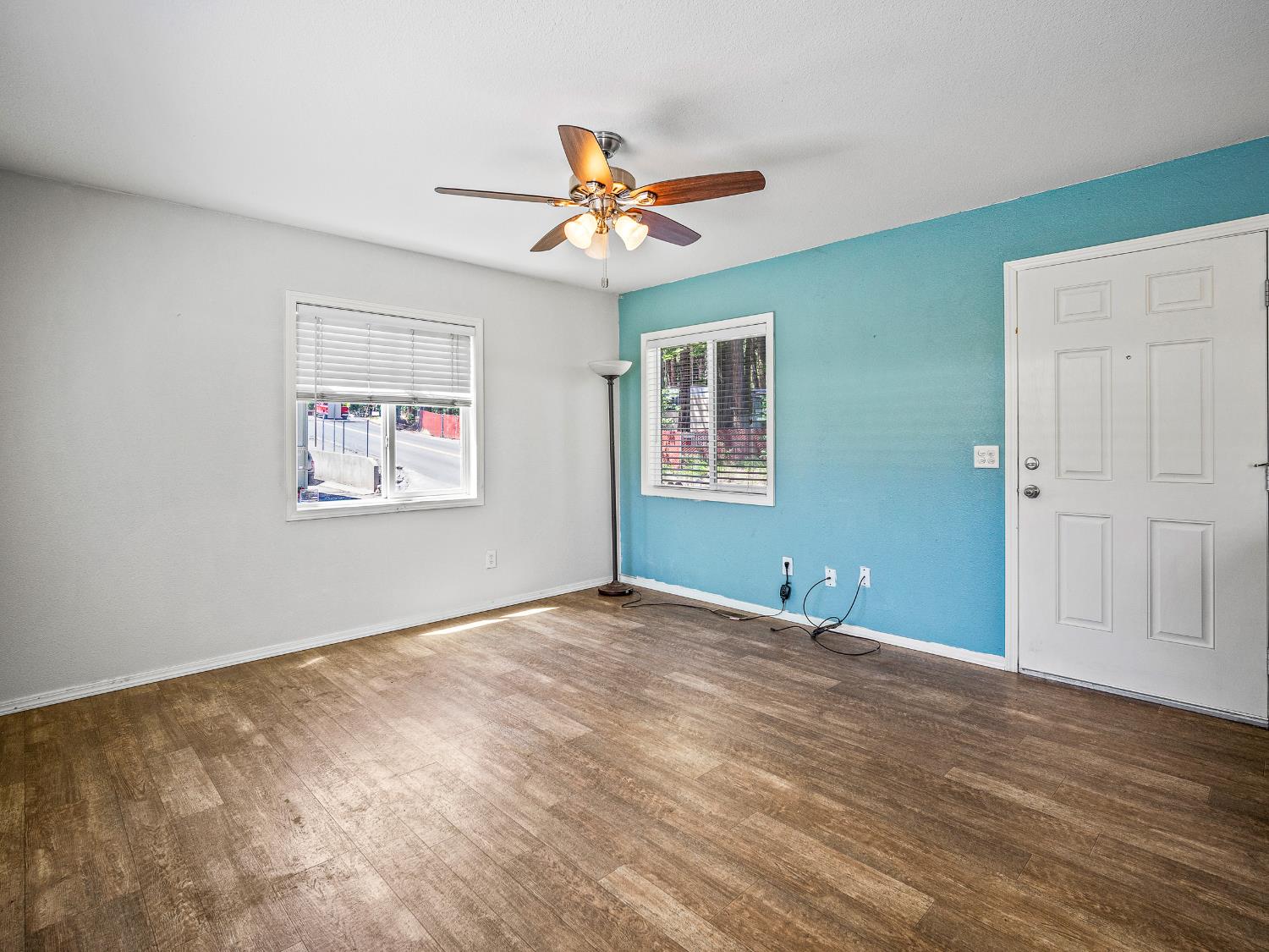 2933 Forebay Road, Unit 28 Pollock Pines, CA 95726 - Photo 13 of 26 a view of an empty room with window and wooden floor