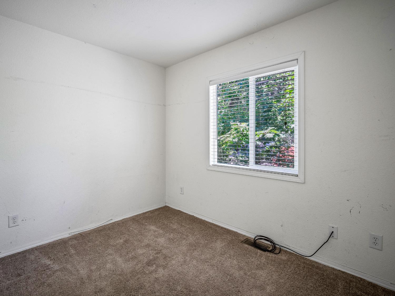 2933 Forebay Road, Unit 28 Pollock Pines, CA 95726 - Photo 9 of 26 an empty room with a window