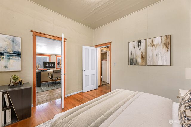 a bedroom with a bed and furniture