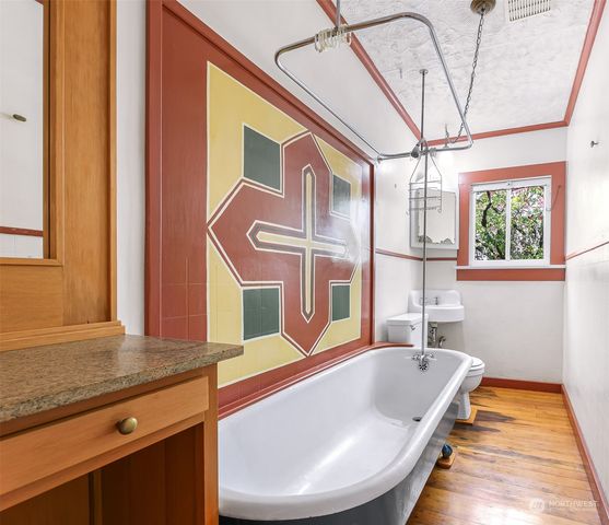 a bath tub sitting next to a window