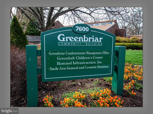 a view of a patio with a table and chairs