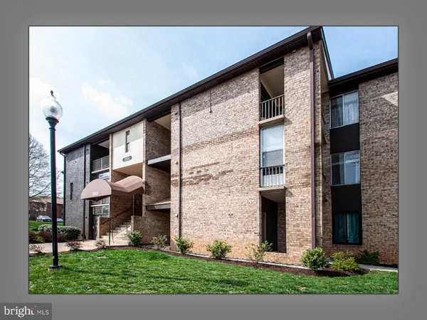 a front view of a building with an outdoor space