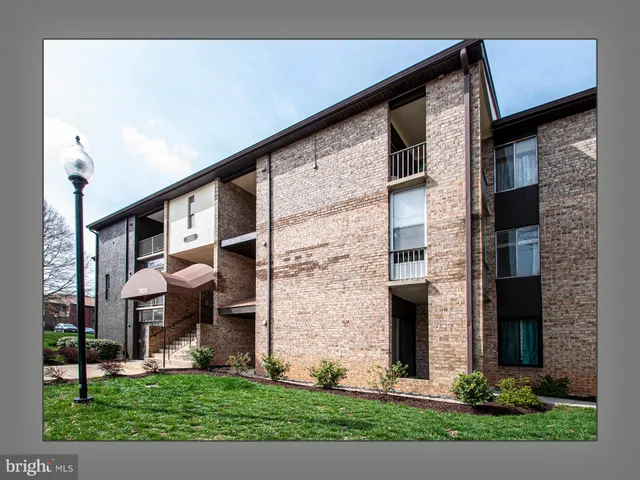 a front view of a building with an outdoor space