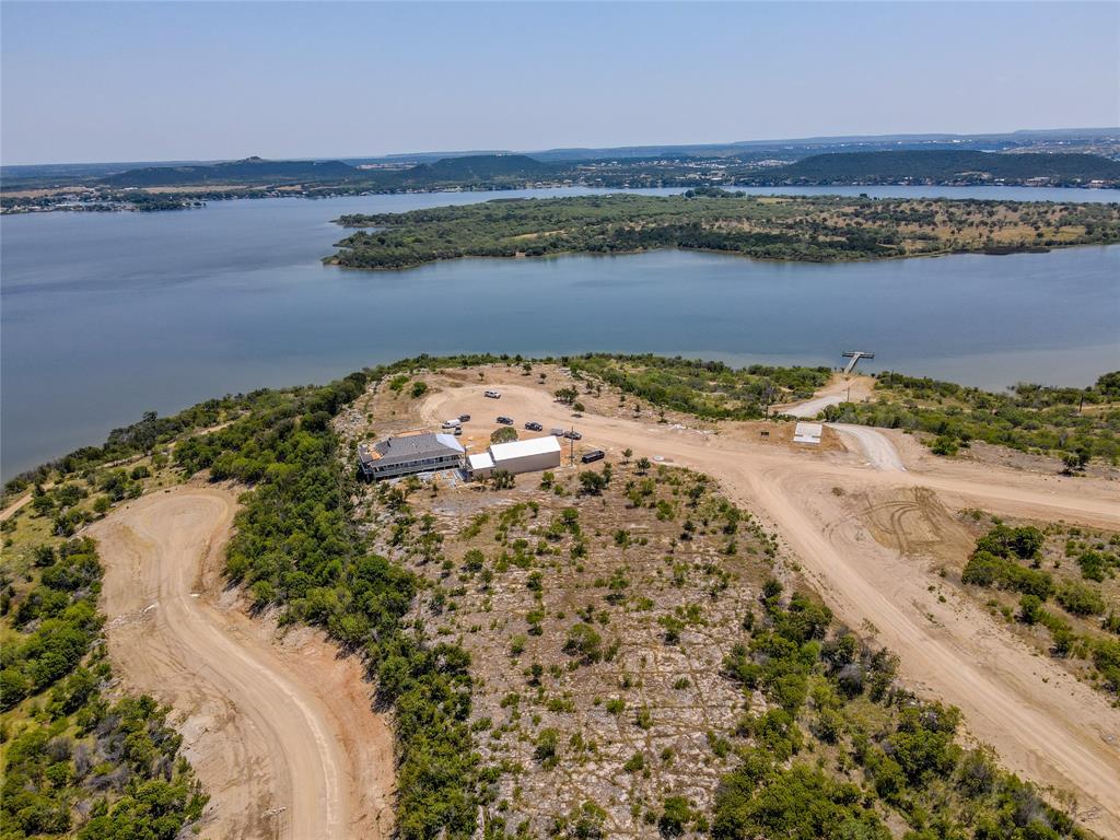 Lot 68 Clearwater Point Graham, TX 76450 - Photo 3 of 10 an aerial view of a houses with a lake view