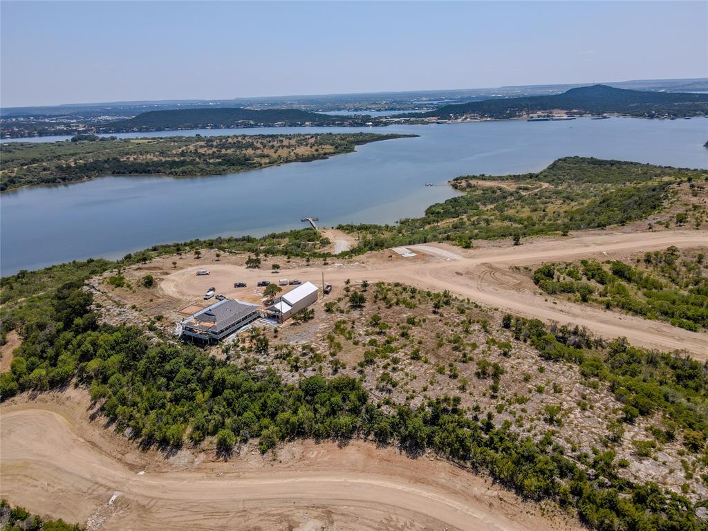 Lot 68 Clearwater Point Graham, TX 76450 - Photo 4 of 10 a view of an ocean and beach