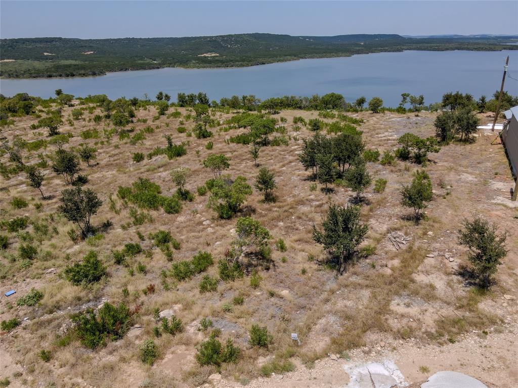 Lot 68 Clearwater Point Graham, TX 76450 - Photo 7 of 10 a view of lake with mountain in background