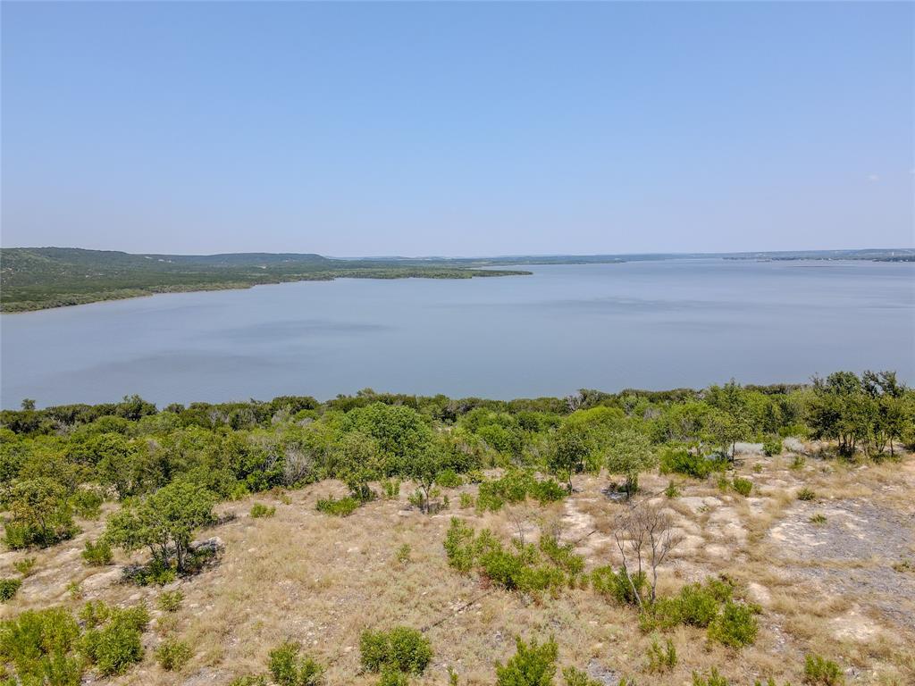 Lot 68 Clearwater Point Graham, TX 76450 - Photo 8 of 10 a view of a lake with a lake