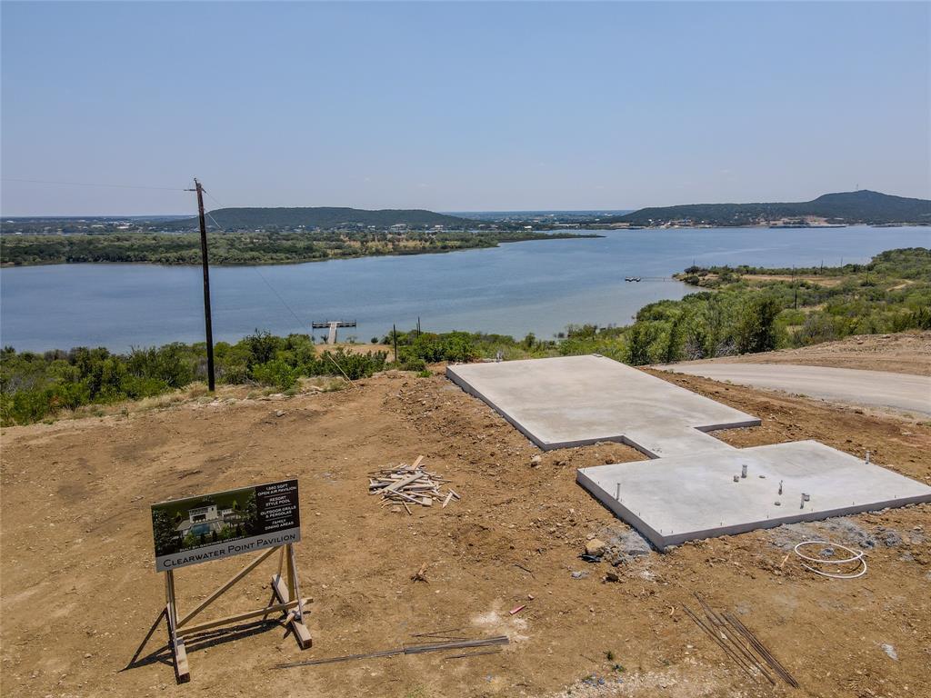 Lot 68 Clearwater Point Graham, TX 76450 - Photo 9 of 10 a view of a terrace with a bench