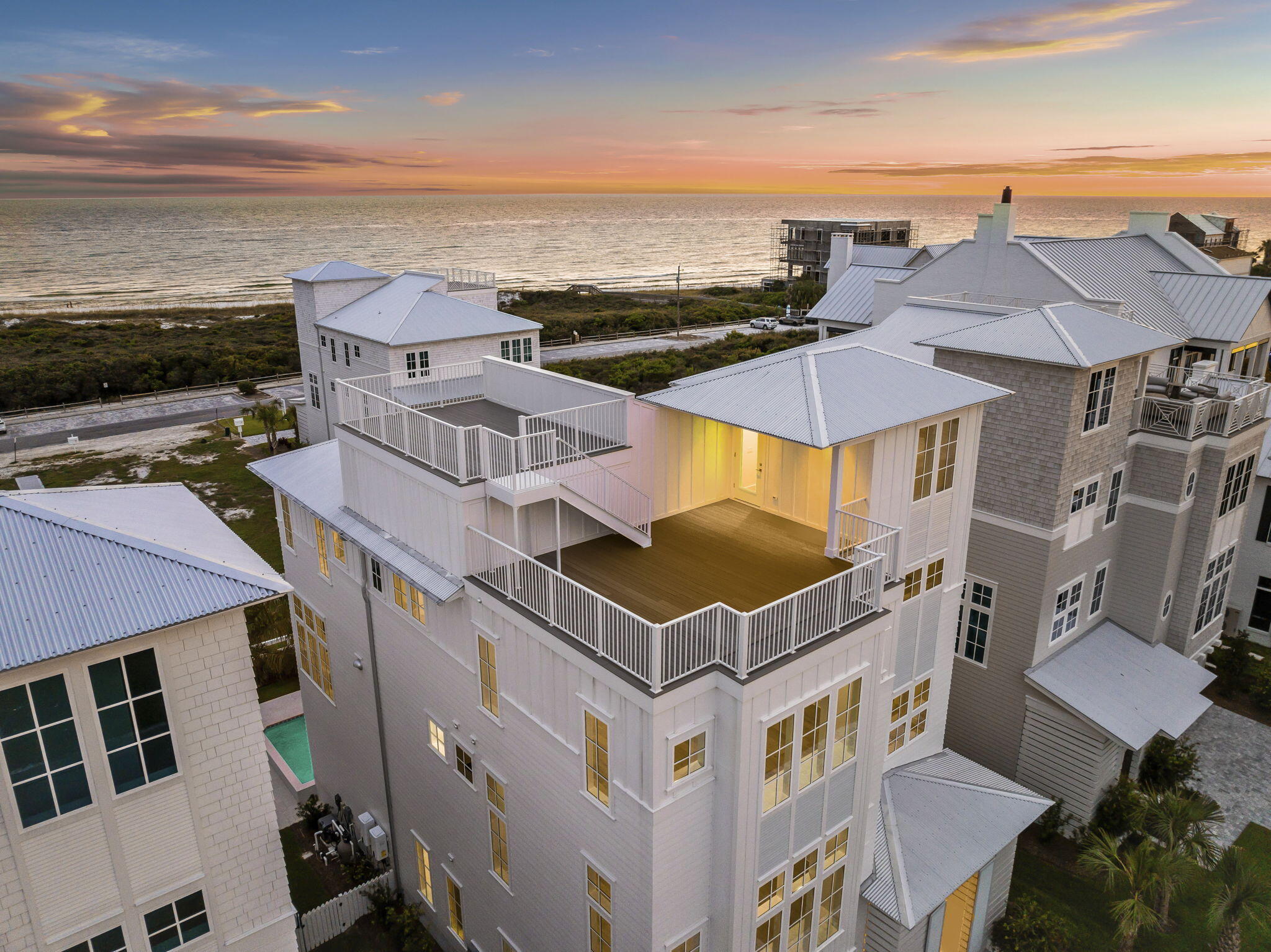 an aerial view of residential houses with outdoor space