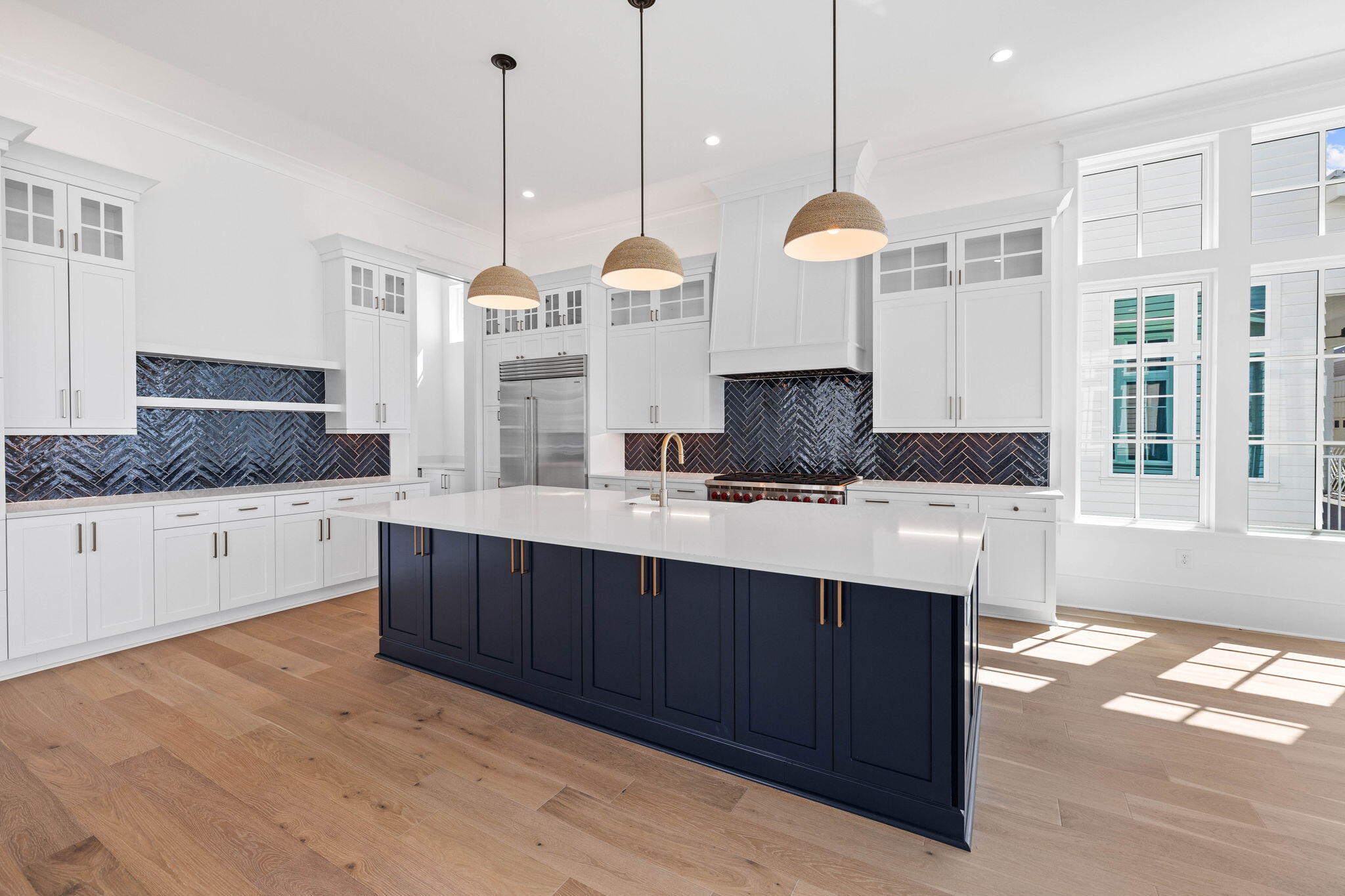 43 Pompano Street Inlet Beach, FL 32461 - Photo 16 of 83 a kitchen with stainless steel appliances granite countertop cabinets a sink and a wooden floor