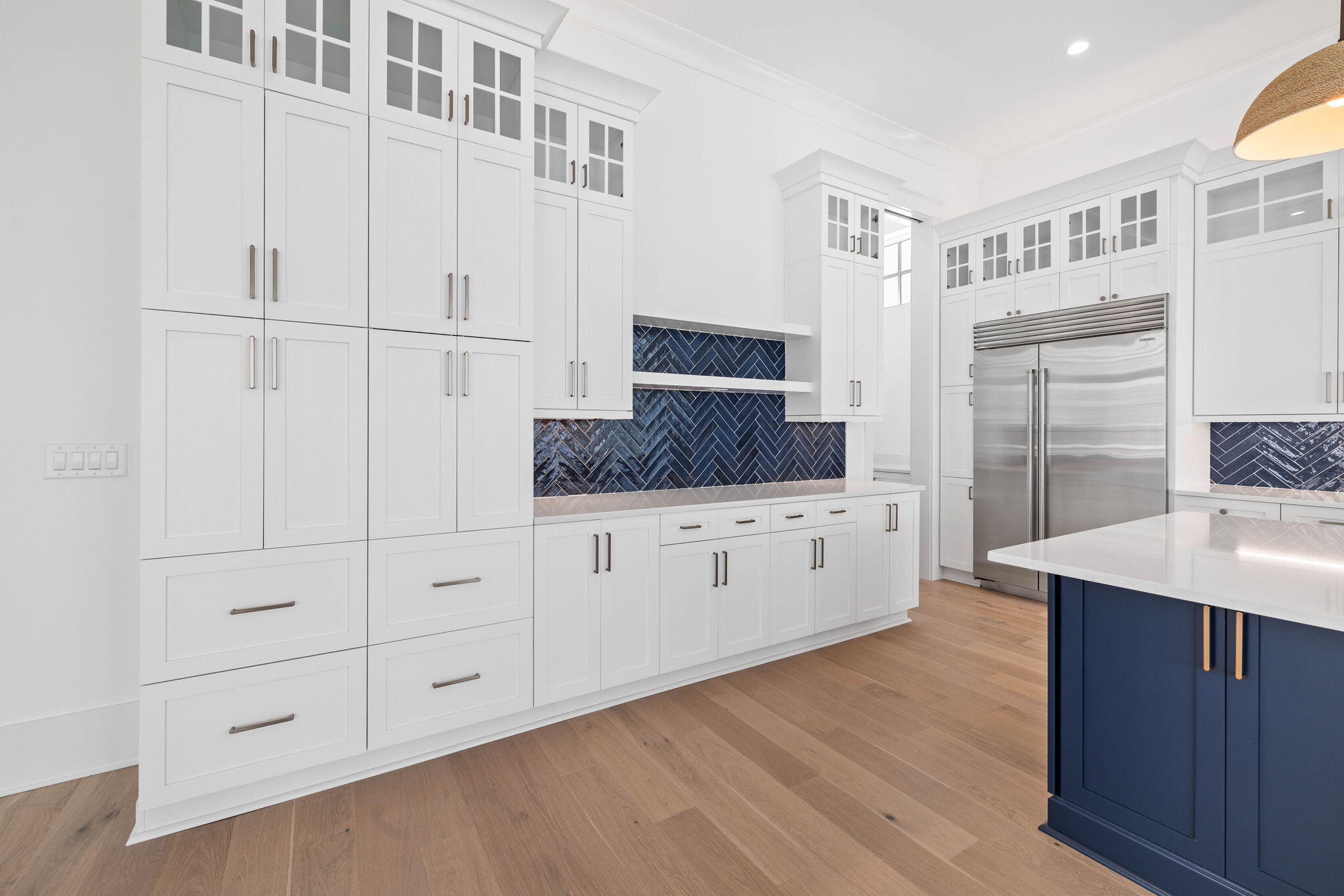 43 Pompano Street Inlet Beach, FL 32461 - Photo 21 of 83 a kitchen with white cabinets and sink