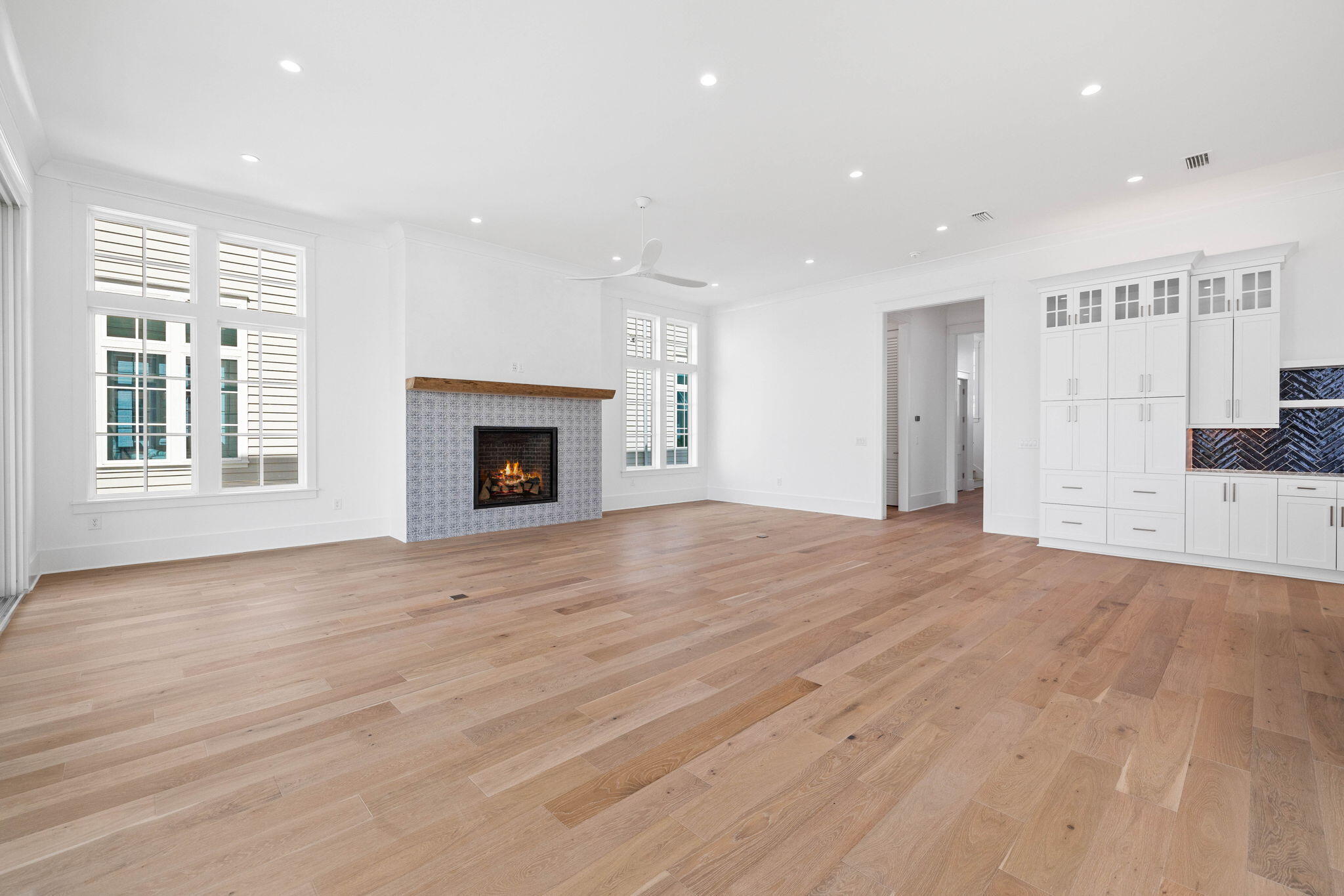 43 Pompano Street Inlet Beach, FL 32461 - Photo 27 of 83 a view of an empty room with wooden floor and a window