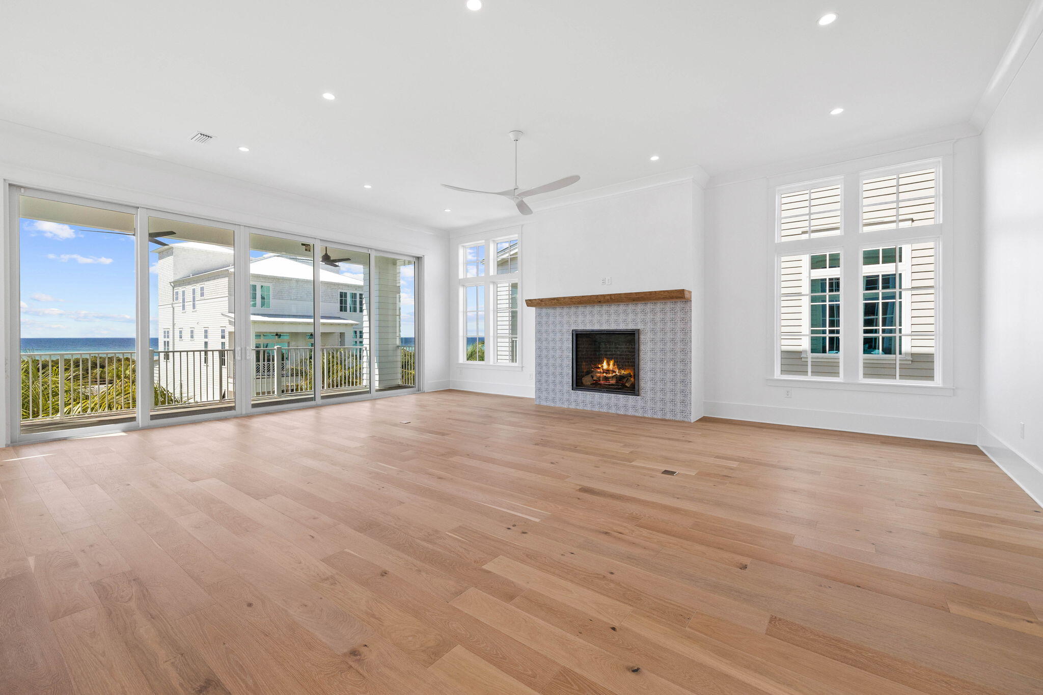 43 Pompano Street Inlet Beach, FL 32461 - Photo 29 of 83 a view of an empty room with a fireplace and a window