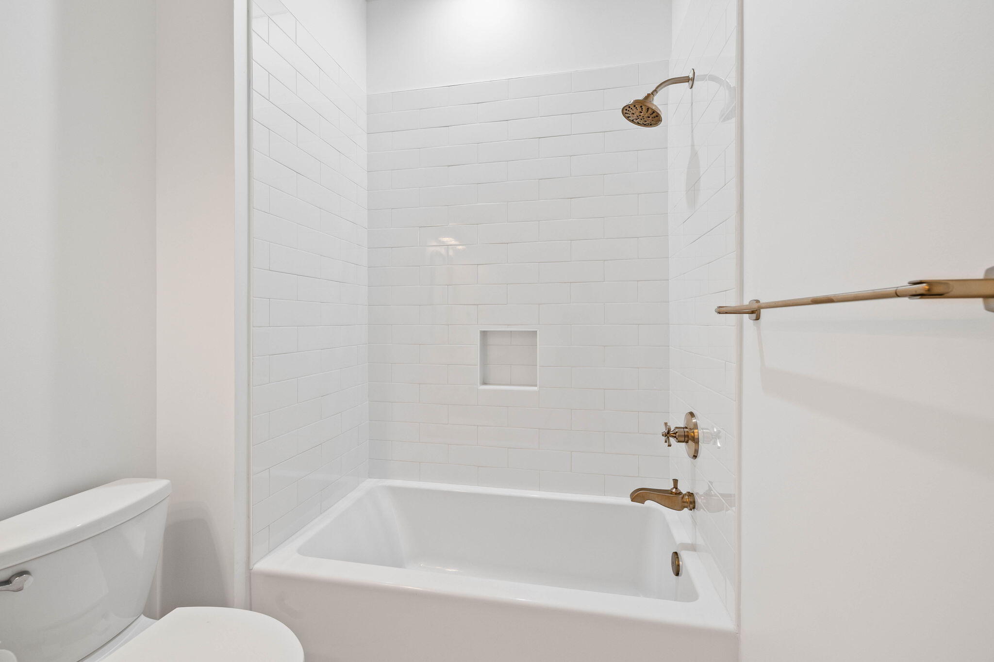 43 Pompano Street Inlet Beach, FL 32461 - Photo 47 of 83 a white bath tub sitting next to a white toilet and vanity