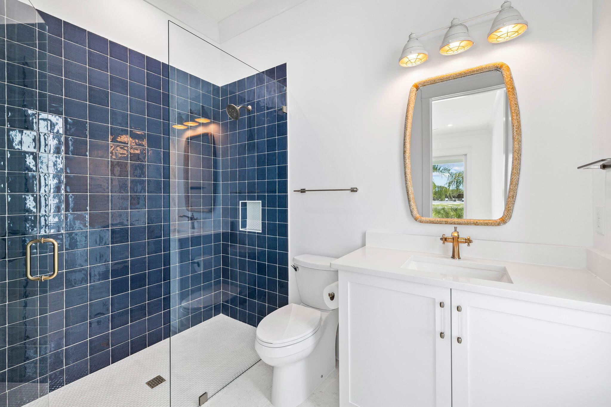 43 Pompano Street Inlet Beach, FL 32461 - Photo 50 of 83 a bathroom with a sink a toilet and mirror