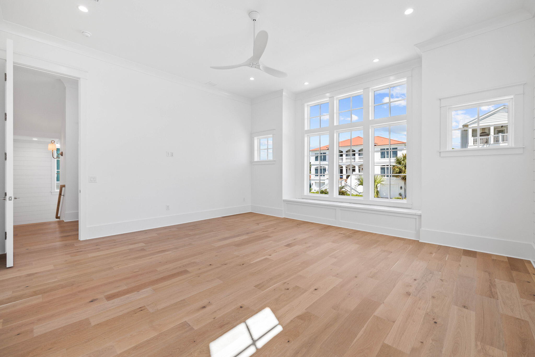 43 Pompano Street Inlet Beach, FL 32461 - Photo 56 of 83 wooden floor in an empty room with a window
