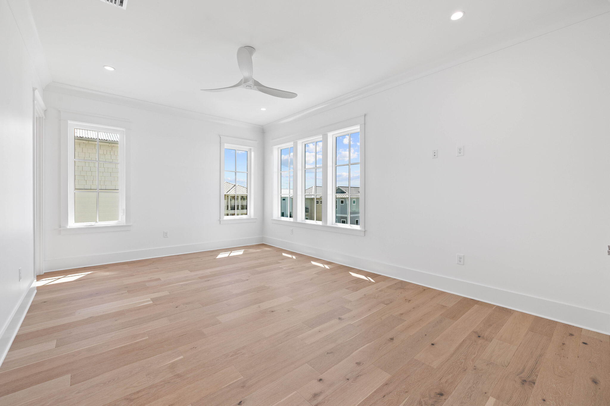 43 Pompano Street Inlet Beach, FL 32461 - Photo 63 of 83 a view of an empty room with wooden floor and a window