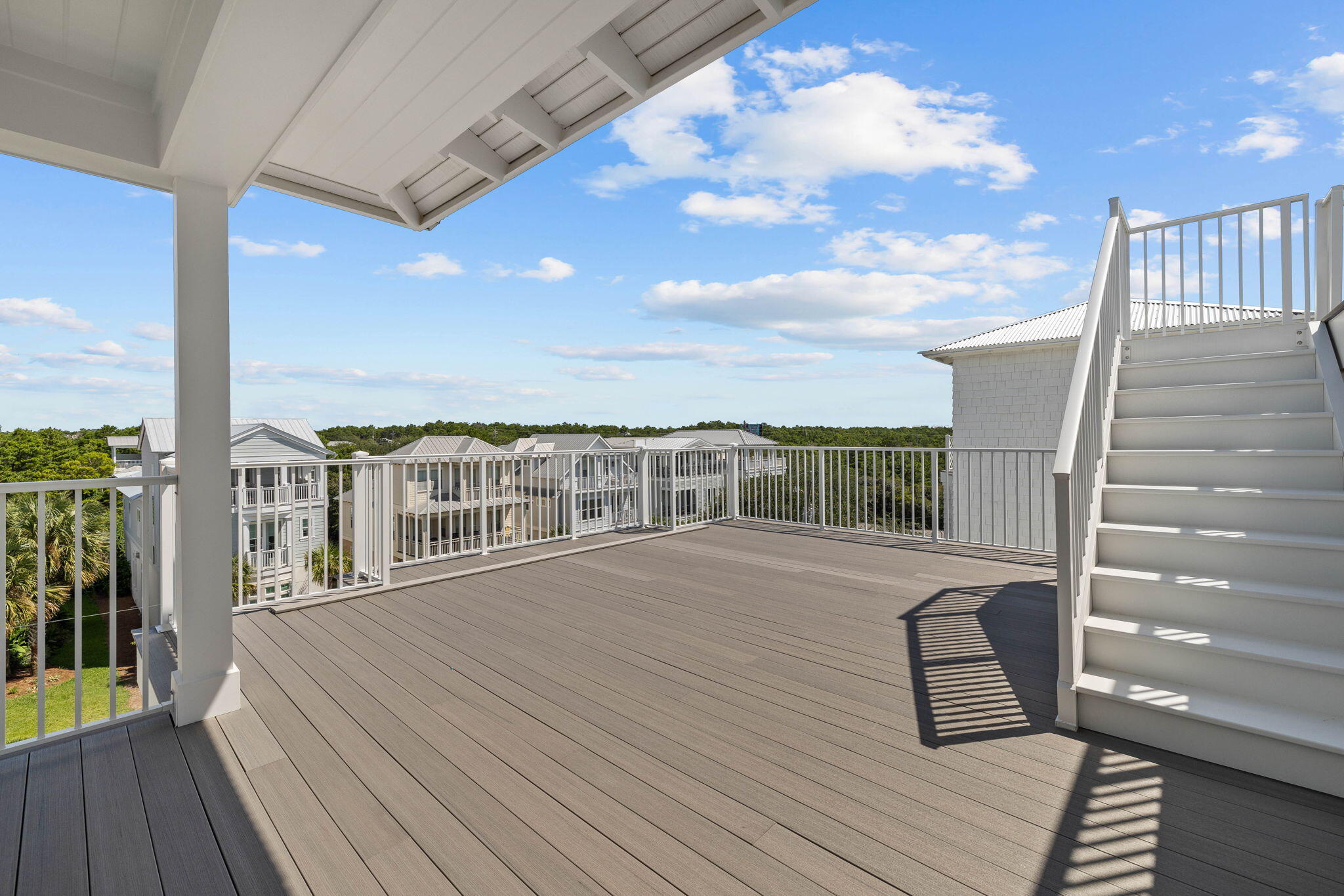 43 Pompano Street Inlet Beach, FL 32461 - Photo 67 of 83 a view of a terrace with wooden floor and city view