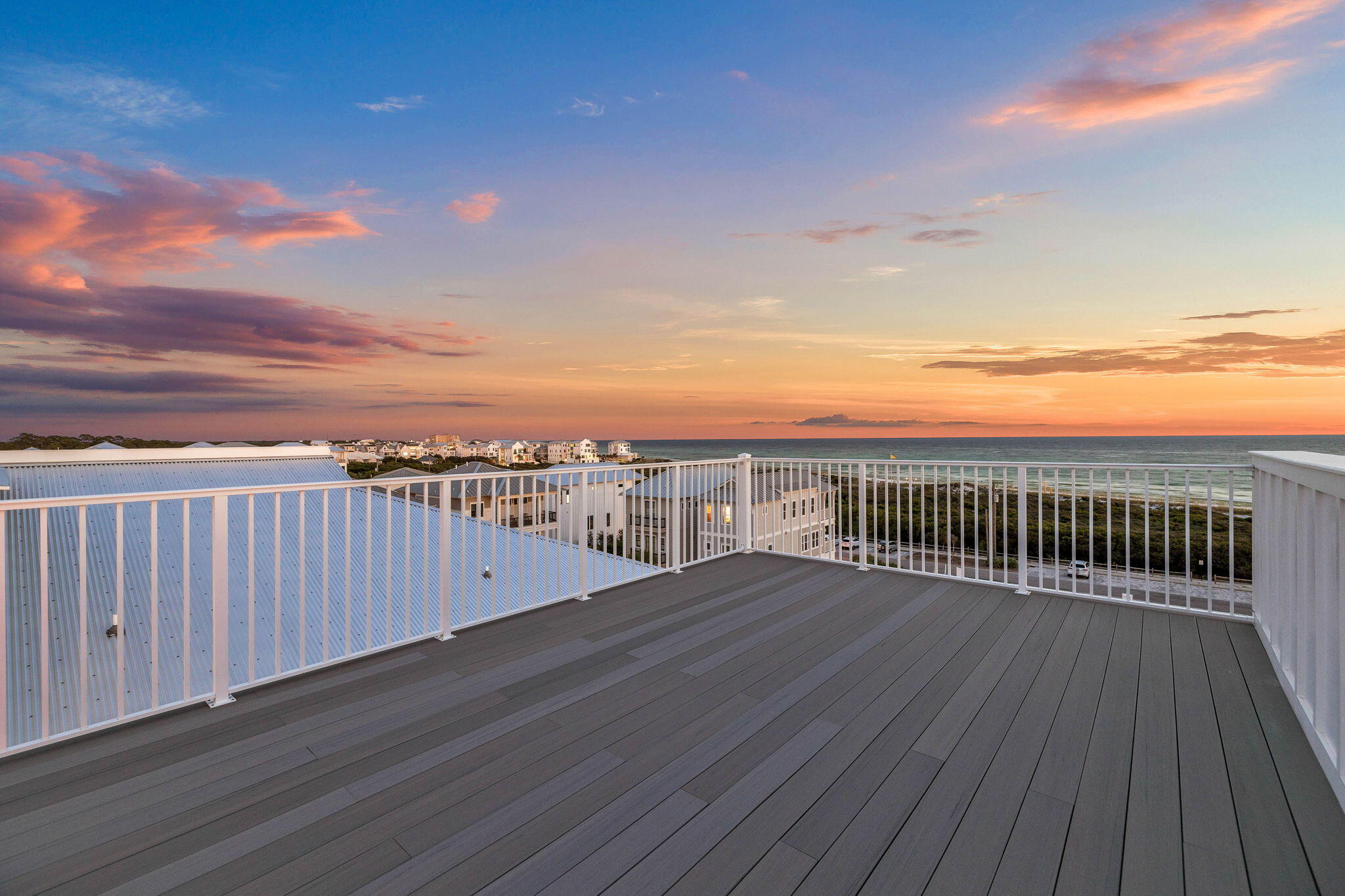 43 Pompano Street Inlet Beach, FL 32461 - Photo 80 of 83 a view of a balcony with wooden floor and city view